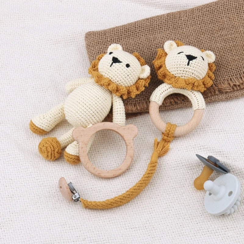 Attaches-suces et jouets pour bébé en tricot lion
